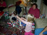 Cameron and Stephanie opening gifts
