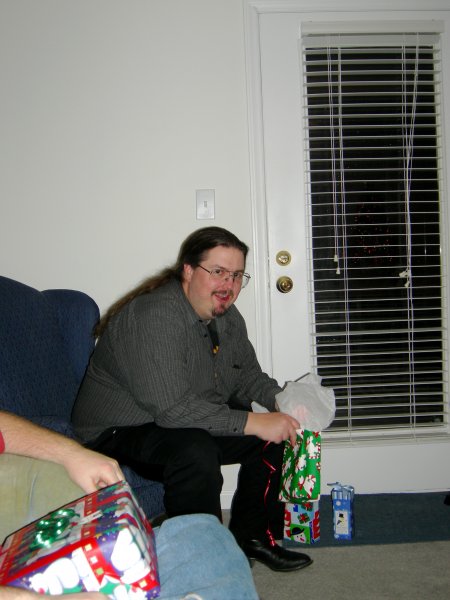 Chris opening his present