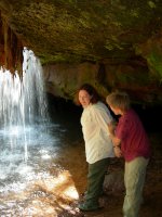 Cynthia and Matthew under the waterfall