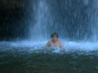 Matthew in front of the waterfall