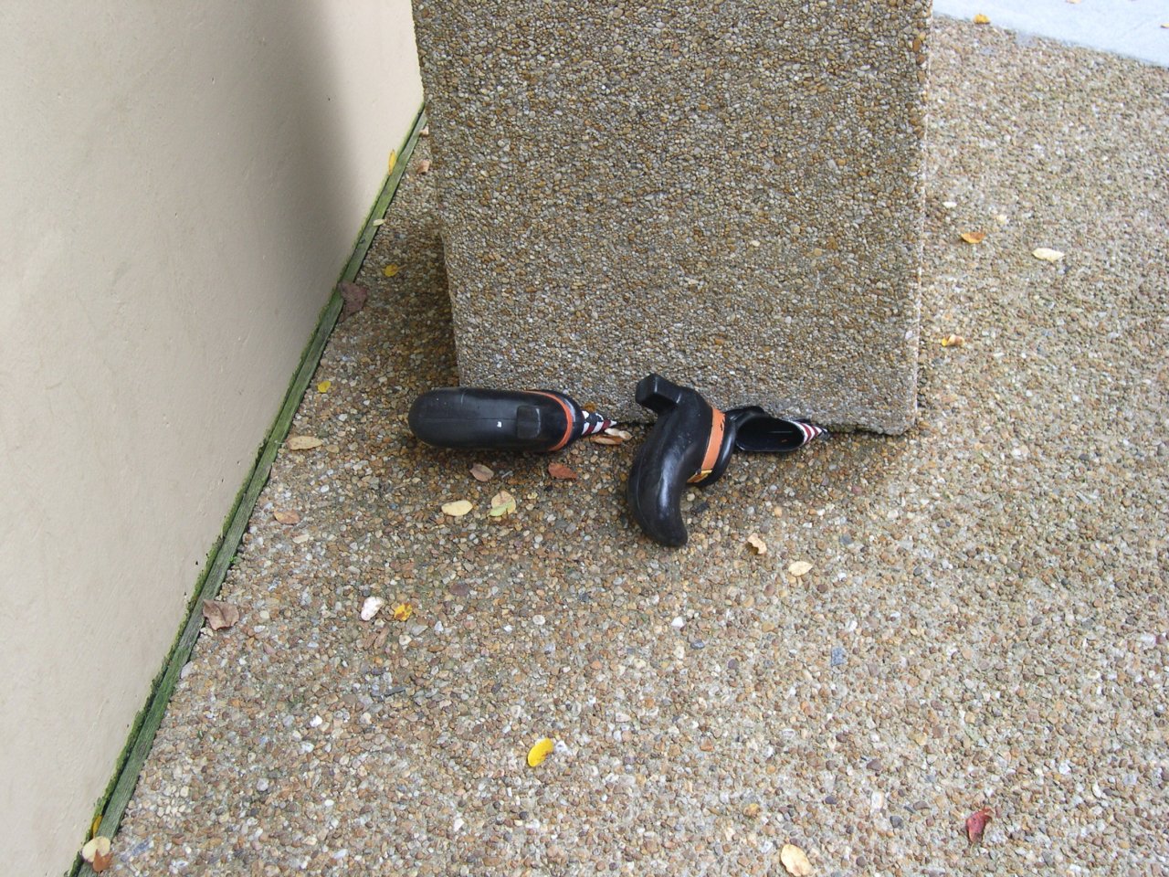 A witch was crushed under this garbage can.