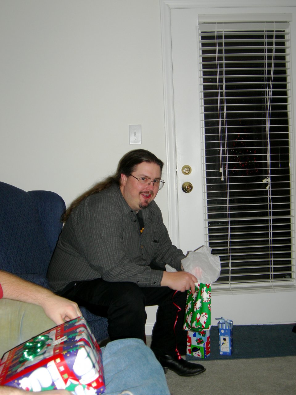 Chris opening his present