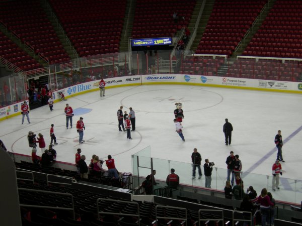 More folks on the ice; I see Pitkanen, Ron the Ref, Stormy, and Leighton.