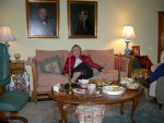 Grandma seated in front of the hors d'oeuvres
