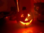 pumpkin candle, lighting up the fog