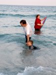 at the beach: Mike, Cameron, and Lysa