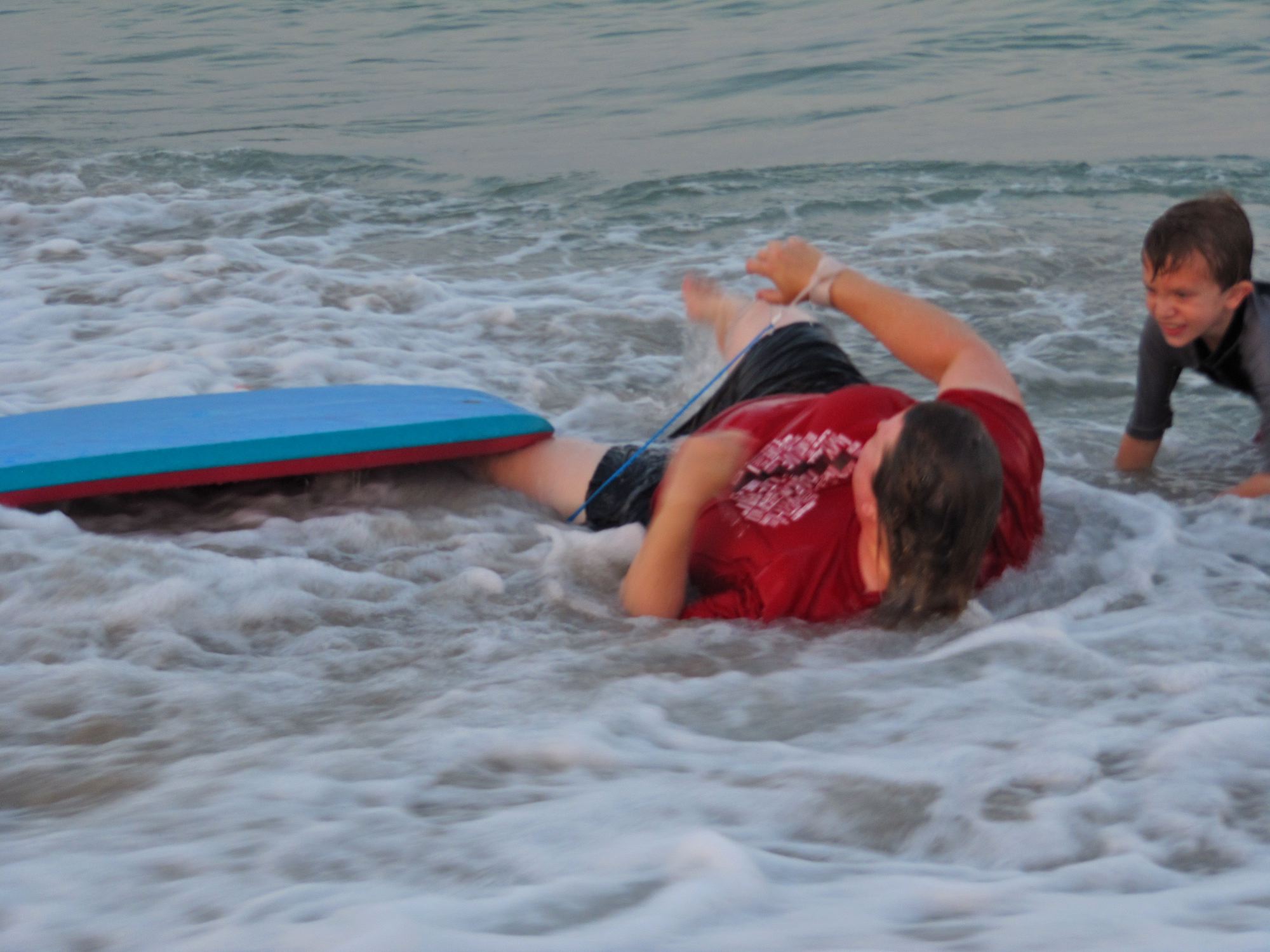 at the beach: Lysa and Cameron fell over