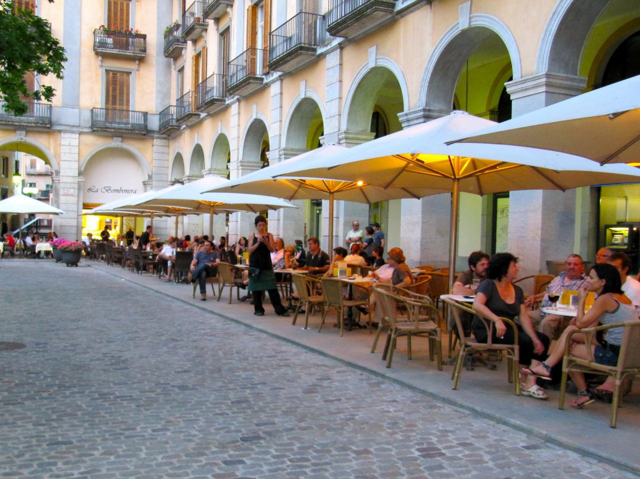 a small square filled with restaurants