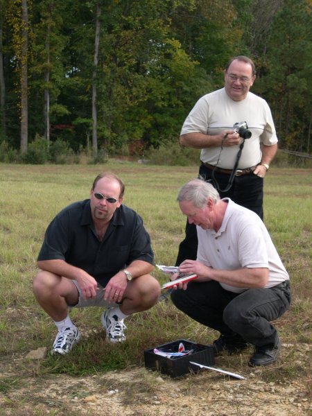 32. Stace, Curt and Billy, checking out the mini-RC plane