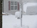 Mailbox with a hat of snow.