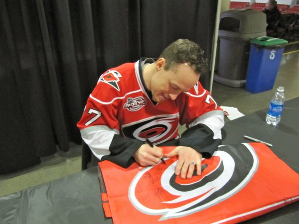 Joe Corvo signing our flag