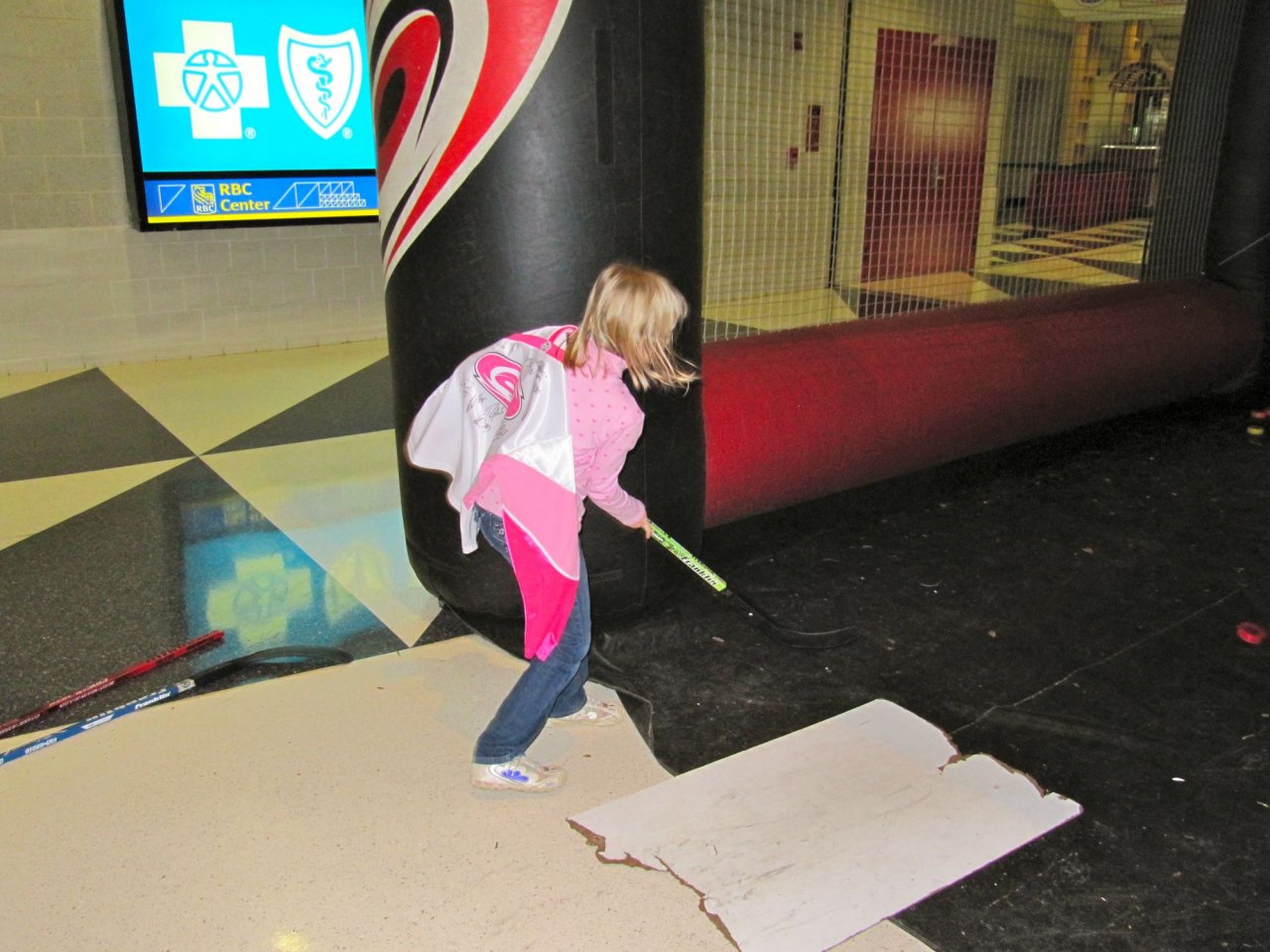 Stephanie shooting a puck