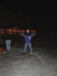 ice skating: Don's skating, and Cynthia's... mooning?
